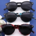 Moderne solbriller med polaroide linser og sort stel.